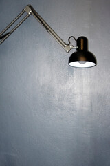 lamp on on dark blue wall background