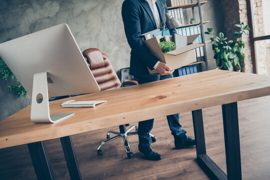 Cropped Photo Of Dismissed Worker Guy Laid Off Fired Manager Agent Lost Job Work Pack Carry Belongings Stuff Big Carton Box Financial Crisis Crash Workstation Empty Desktop Office Indoors