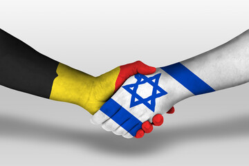 Handshake between israel and belgium flags painted on hands, illustration with clipping path.