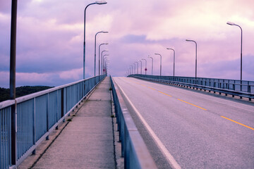 Road bridge over the fjord at sunset. Saltstraumen bridge. Saltstraumen, Norway