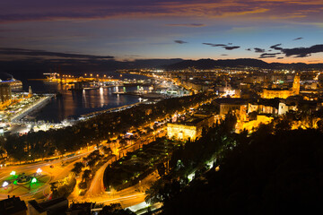 Fototapeta na wymiar Aerial view of Malaga and Mediterranean in evening time