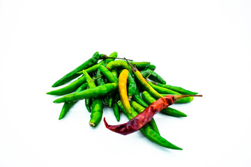 Close Up View of Fresh Red Green Chili Peppers On Isolated White Background. Creative image of hot raw green red chilli in food vegetable pattern with noise grain effect. Chile At Copy Space For Text.