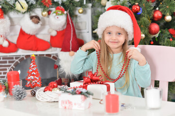 Portrait of beautiful pregnant woman posing by bathtub