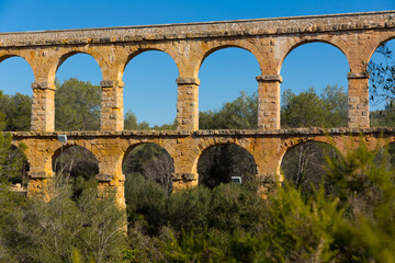 Tarragona famous bridge Puento del diablo at sunny day view, Spain..