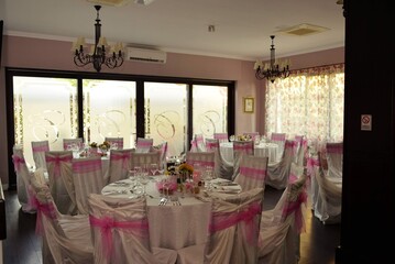 living room with festive meals. restaurant arranged for the event