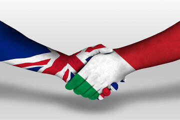 Handshake between italy and united kingdom flags painted on hands, illustration with clipping path.