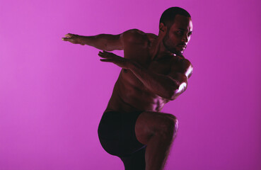 Fit man working on core strength training