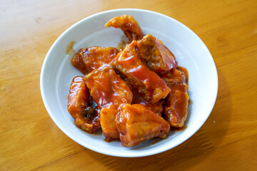 Chinese family dish, fried fish in tomato sauce