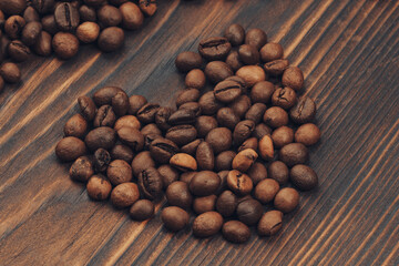 Image of heart shaped roasted coffee beans.