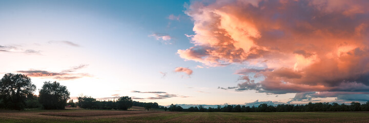 Fototapeta premium Ethereal sunset on fields