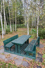 wooden table with benches in park Finland Europe