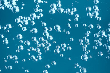 air bubbles in water macro background / blue background abstract bubbles in water