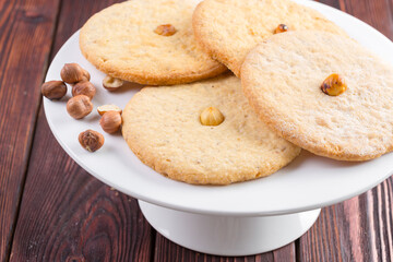 Oat cookies served on wooden table close up