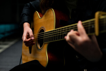 Fototapeta na wymiar Girl playing guitar