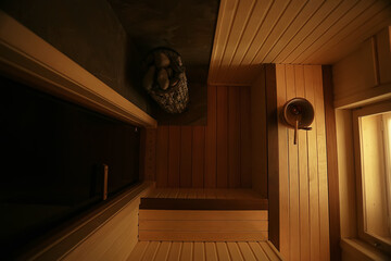 sauna, wooden interior baths, wooden benches and loungers accessories for sauna, spa complex in the hotel