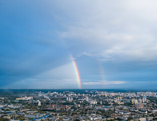 Naklejka na ściany i meble Double rainbow over a residential area of Kiev. Aerial drone view.