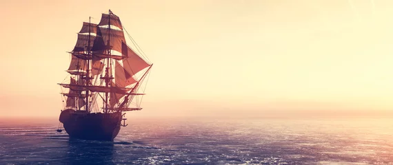 Fotobehang Piratenschip zeilen op de oceaan bij zonsondergang © Photocreo Bednarek