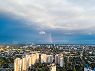 Obraz premium Aerial drone view. Rainbow over a residential area of Kiev.