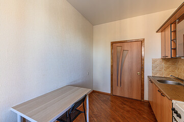 Russia, Moscow- February 15, 2020: interior room apartment modern bright cozy atmosphere. general cleaning, home decoration, preparation of house for sale. kitchen, dining area