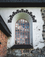 Window of an old 16th century granite church