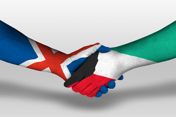 Handshake between kuwait and iceland flags painted on hands, illustration with clipping path.