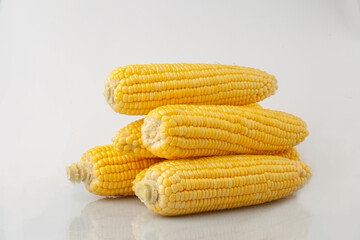 Yellow fresh corn on white background