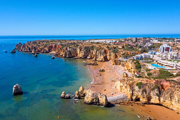 Fototapeta premium Aerial from Praia do Camillo on a rocky southcoast near Lagos in Portugal