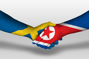 Handshake between north korea and sweden flags painted on hands, illustration with clipping path.