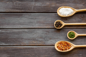 Herbs spices and flavoring on kithen desk, top view