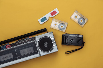 Retro old school attributes 80s on yellow background. Top view. Flat lay