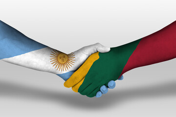 Handshake between lithuania and argentina flags painted on hands, illustration with clipping path.