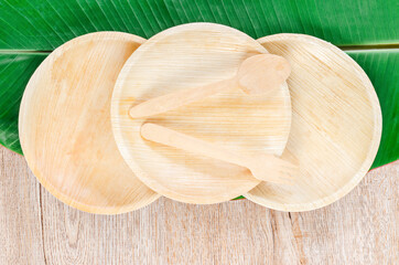 Kitchenware made from dried betel nut leaf palm, natural material.