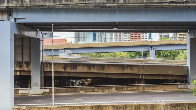 Time Lapse 4k, Skyline on Witthayu Road, commonly known in English as Wireless Road, car traffic on highway rush hour in a cloudy day, near the business district, Bangkok, Thailand.