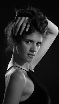 portrait of a young woman in black dress