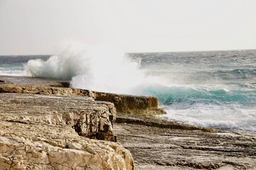 waves crashing on rocks on Croatian coast.