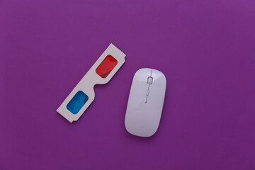 PC mouse and anaglyph 3D glasses on purple background. Top view. Minimalism