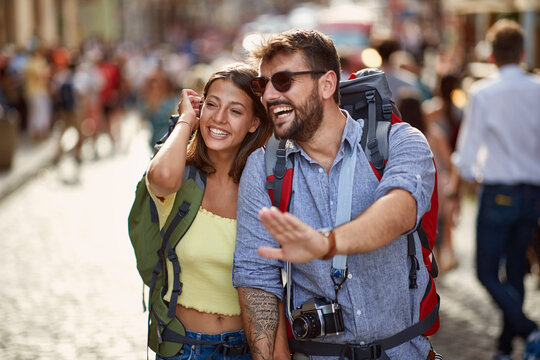 Traveling  in Europe.Couple traveling together smiling and enjoying at summer vacation.