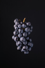 Grape on black background