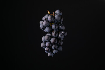 Grape on black background