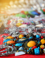 Silver brass necklace decorated with yellow, red, blue stone beads and multi-colored gems is a beautiful jewelry.