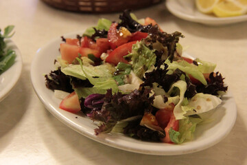 delicious fish and salads on presentation plate