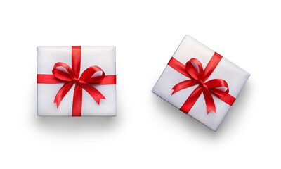 Top view of Christmas, birthday presents wrapped in white paper with red ribbon and bow decoration isolated against a white background.