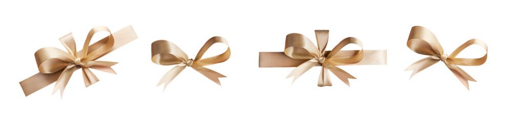 A collection of gold ribbon bows for Christmas, birthday and valantines presents isolated against a...