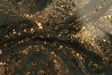 Macro black and gold Abstract bubble drop texture background. Acrylic color in water and oil.