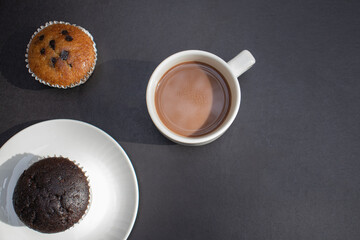 cup of coffee with chocolate cupcakes