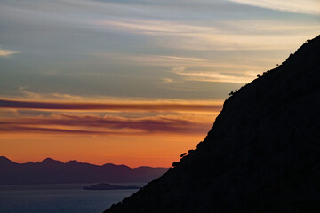 A beautiful sunset over a lake and mountain in Turkey