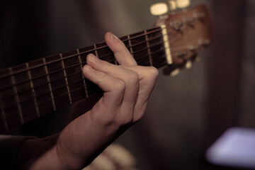 man playing guitar