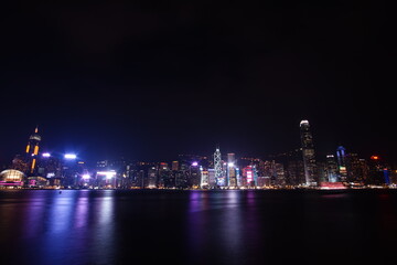 Fototapeta na wymiar City landscape. Victoria Harbor and Hong Kong skyscrapers at night