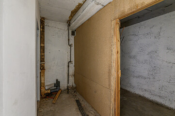 Russia, Moscow- February 15, 2020: interior room rough repair for self-finishing. interior decoration, bare walls of the premises, stage of construction