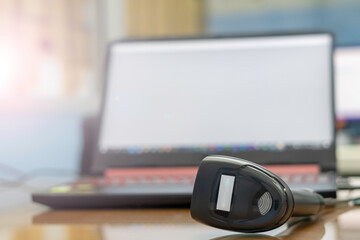 Barcode reader for transfer data to notebook computer.